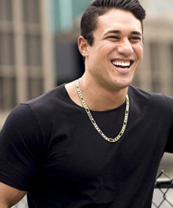 gold plated 9mm Figaro Chain worn by a man as his necklace