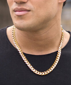 Gold Plated 11mm Gold Cuban Link Chain worn by a guy in black as his necklace