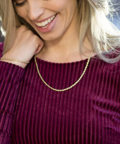 Gold Plated 3mm Rope Chain worn by a woman in maroon as her necklace