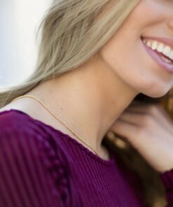 Gold Plated 1mm Rope Chain worn by a woman as her necklace